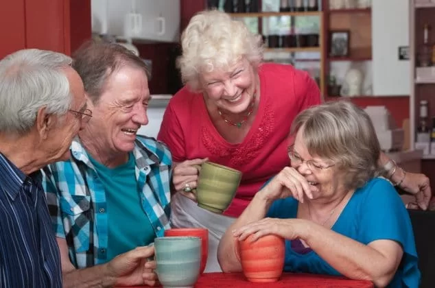 Senior citizen group meeting at a coffee shop