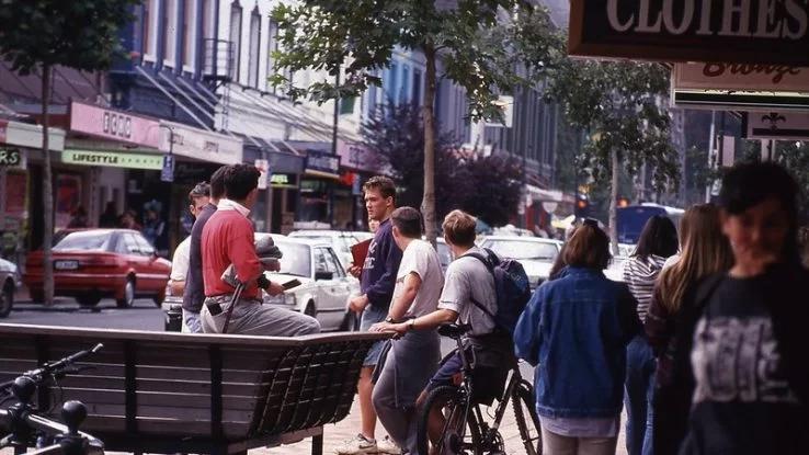 Busy city street in the 1990s