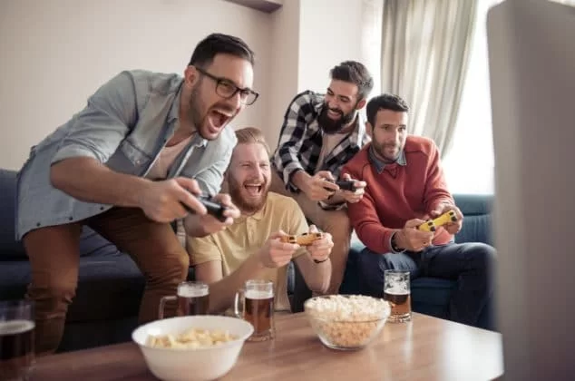 Group of friends playing video games with a cool clan name