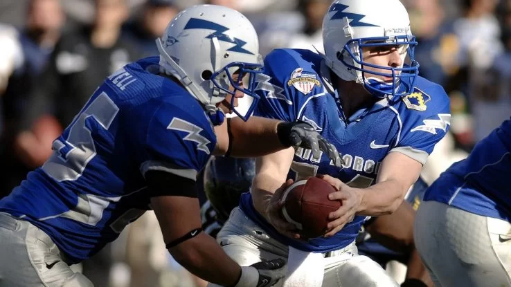 Football players in the middle of a game