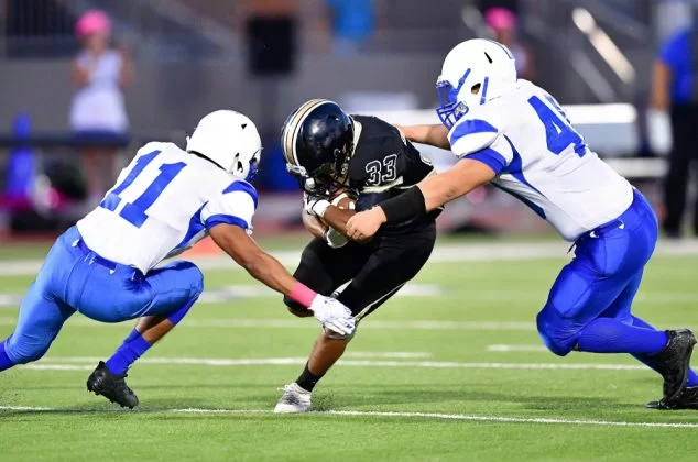 Players on the field during a football game