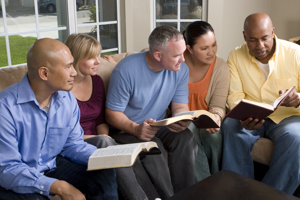 Church group for adults meeting to discuss scripture