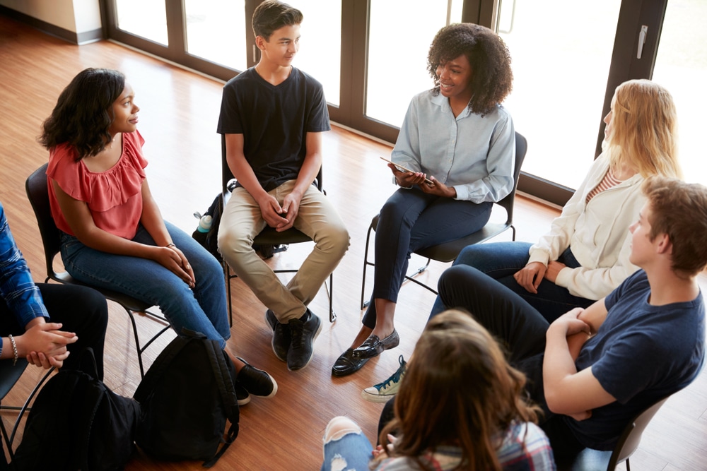 Teen Sunday school class discussing a lesson