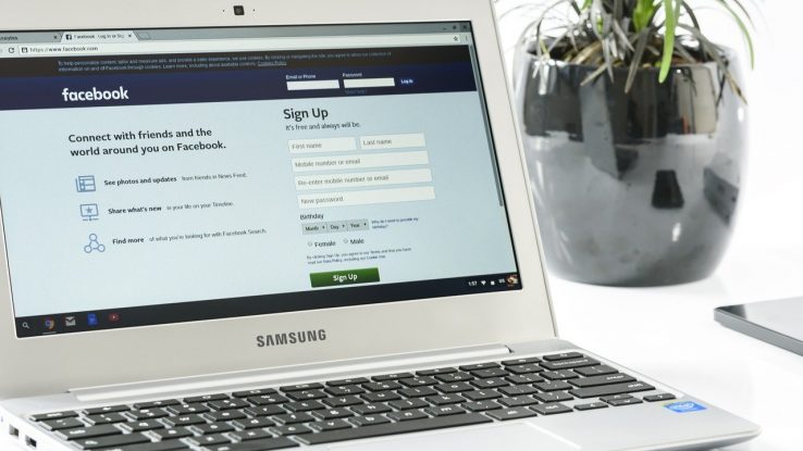 Facebook login page displayed on laptop