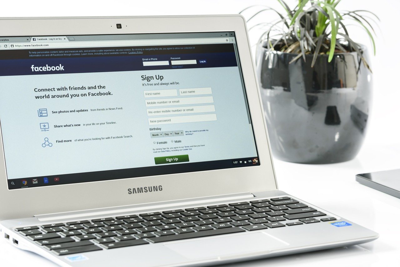 Facebook login page displayed on laptop