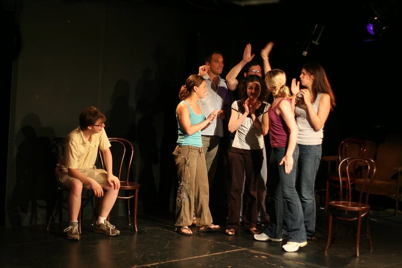 Comedy/improv group performing on stage