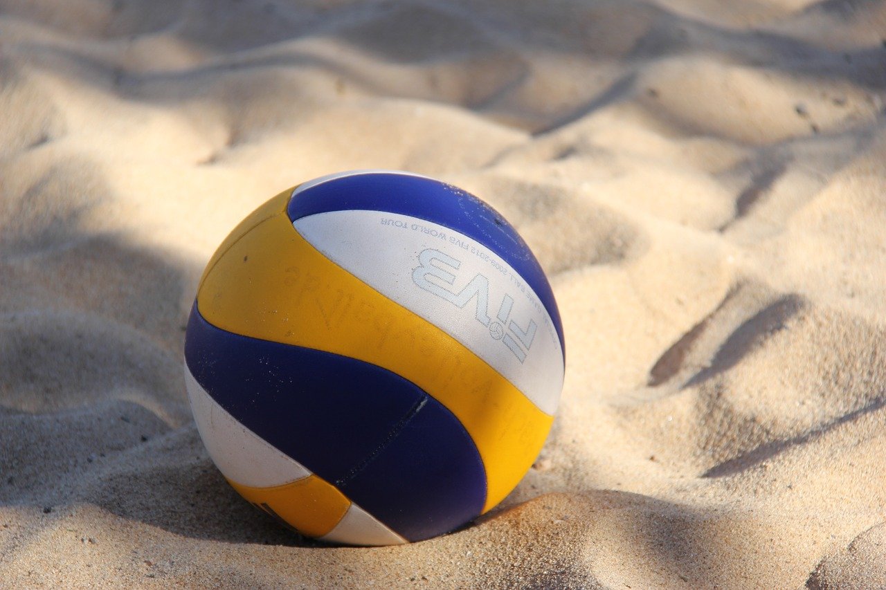 Ball in sand at outdoor throwball game