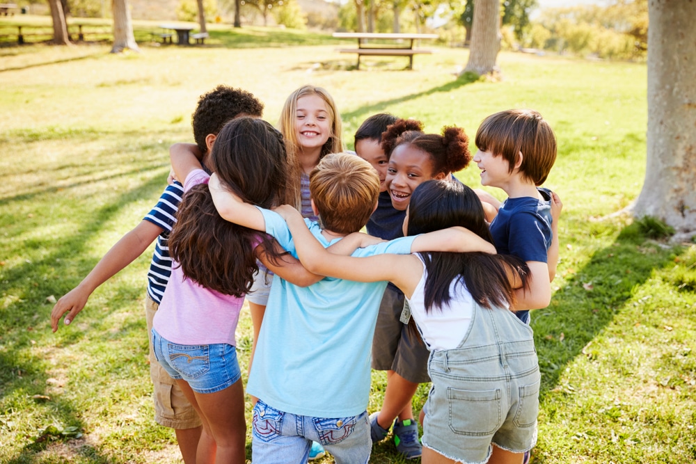 Kids' club in a huddle