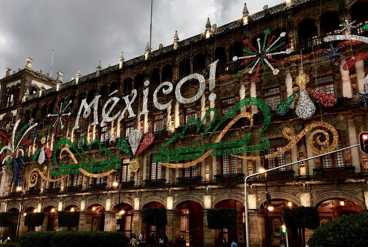 "Mexico!" decorations on a building in Mexico City
