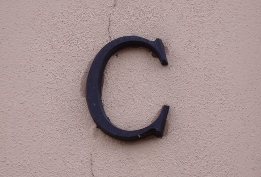 Letter "C" on the side of a building