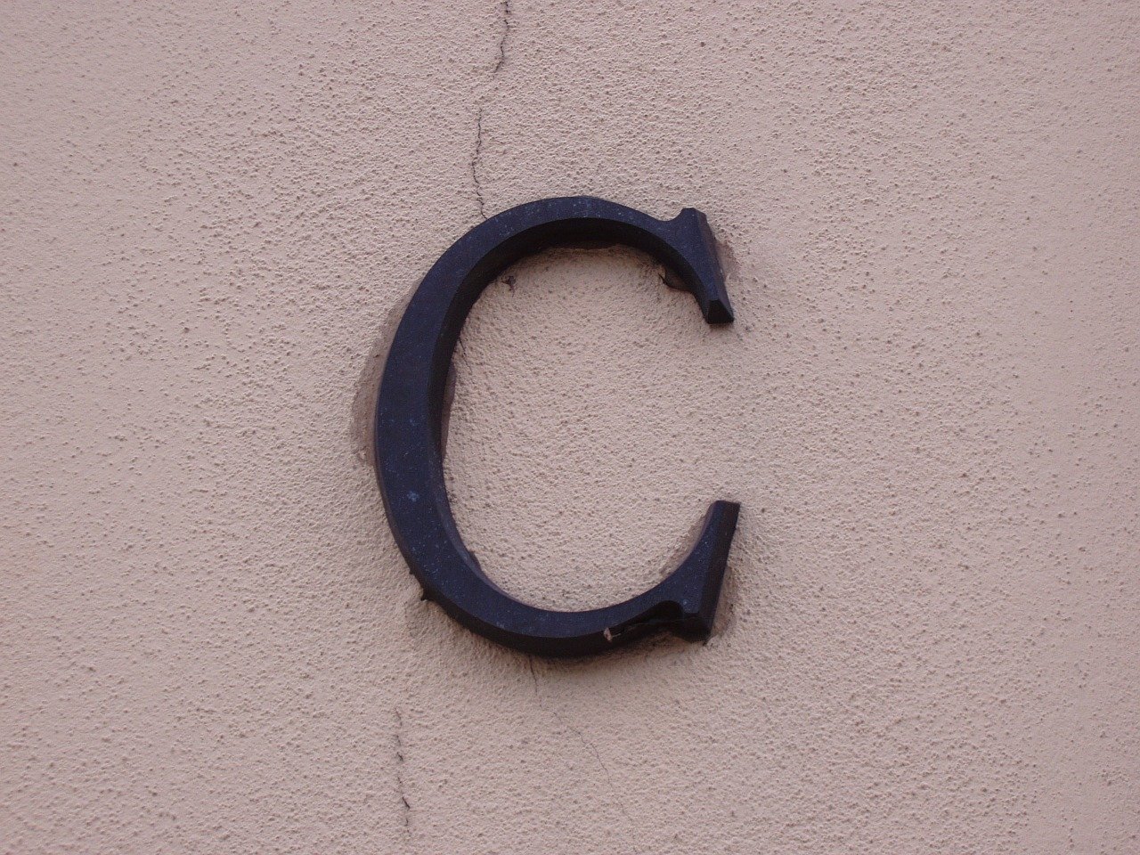 Letter "C" on the side of a building