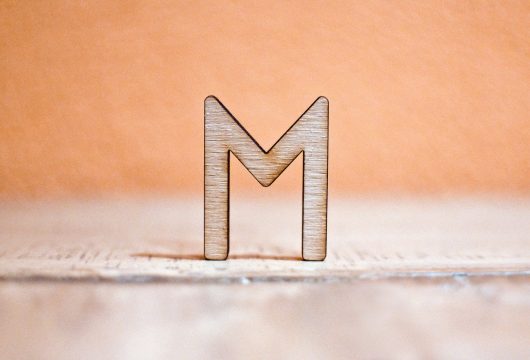 Letter "M" made from wood
