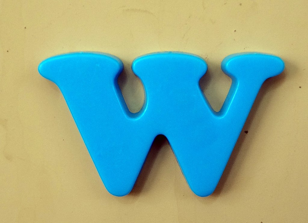 Blue letter "W"