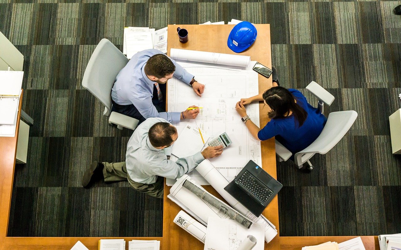 Project team working at a large table