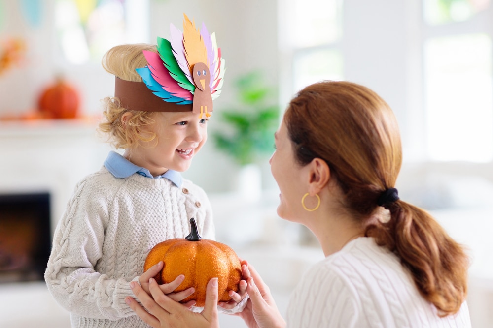 Child and mother celebrating Thanksgiving