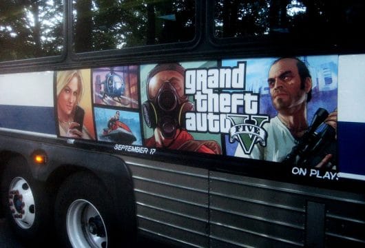 GTA V advertisement on the side of a bus