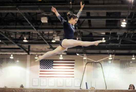 Gymnast practicing for a team event