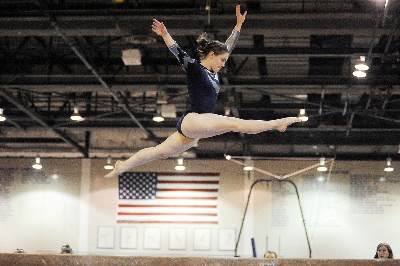 Gymnast practicing for a team event