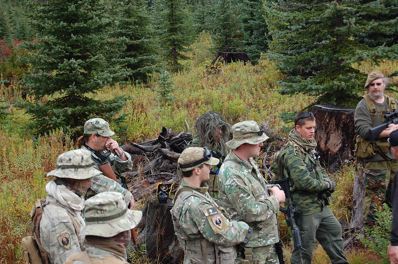 Airsoft team strategizing before a battle