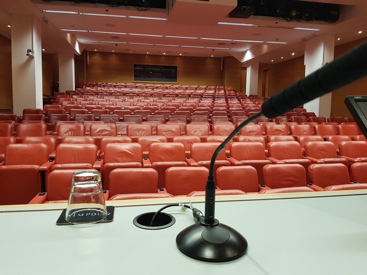Microphone set up on in an auditorium for a debate team event