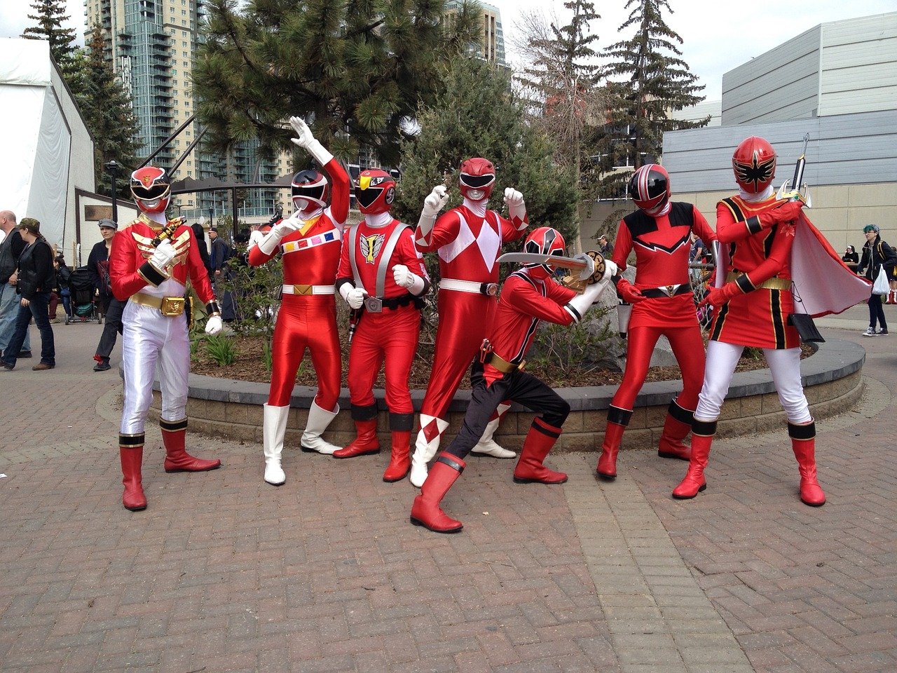 Superhero team wearing red costumes