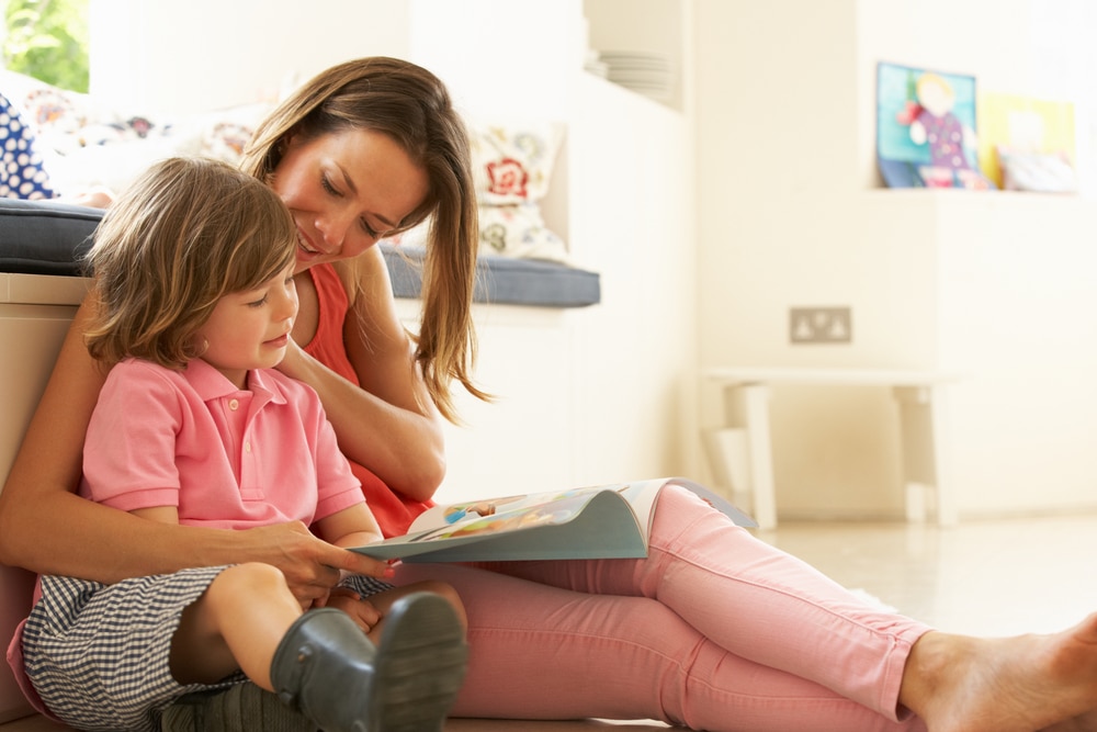 Usborne VIP group customer reading to a child