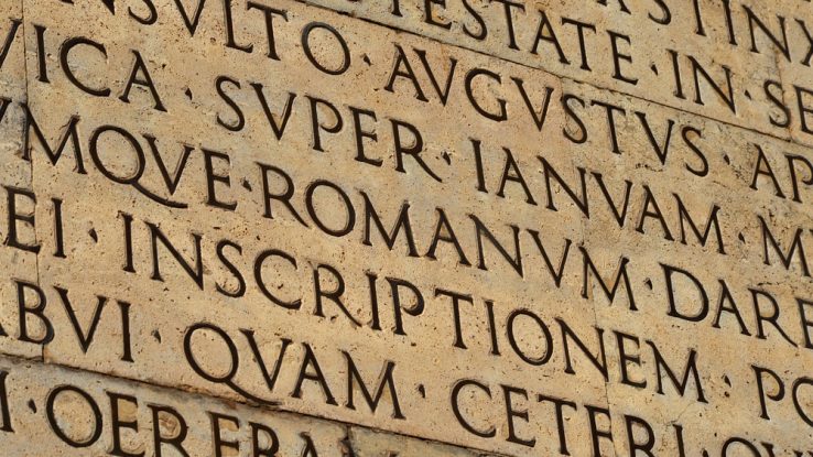 Latin words inscribed on stone