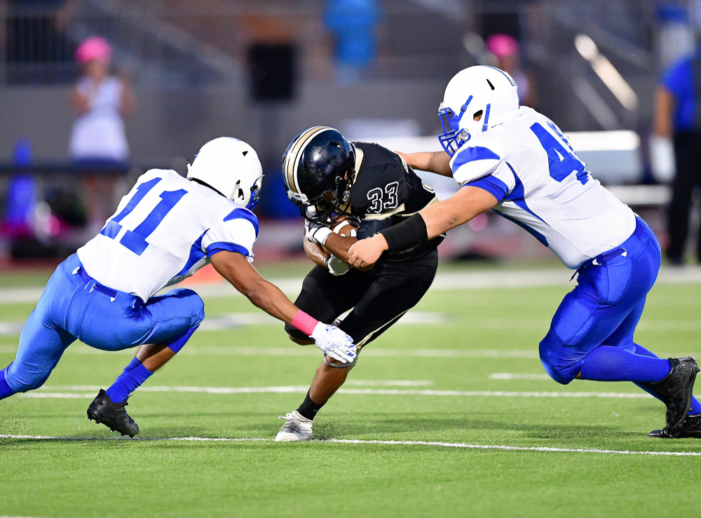 Players on the field during a football game